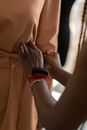 Person Wearing Black and Red Watch