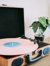 Pink Vinyl Record Put on Turntable of Record Player