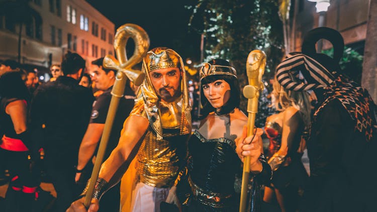 A Couple Wearing Egyptian Costumes