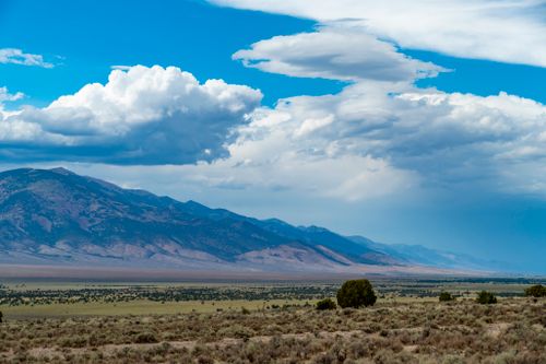 Free Breathtaking view of mountains under a clear blue sky, perfect for nature lovers. Stock Photo