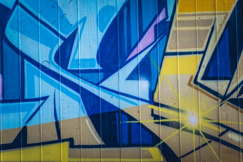 Free Blue and Yellow Painting on the Wall  Stock Photo