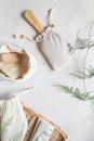 White Textile Beside Brown Woven Basket