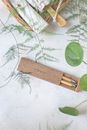 Brown Wooden Sticks on White and Green Leaves Print Textile