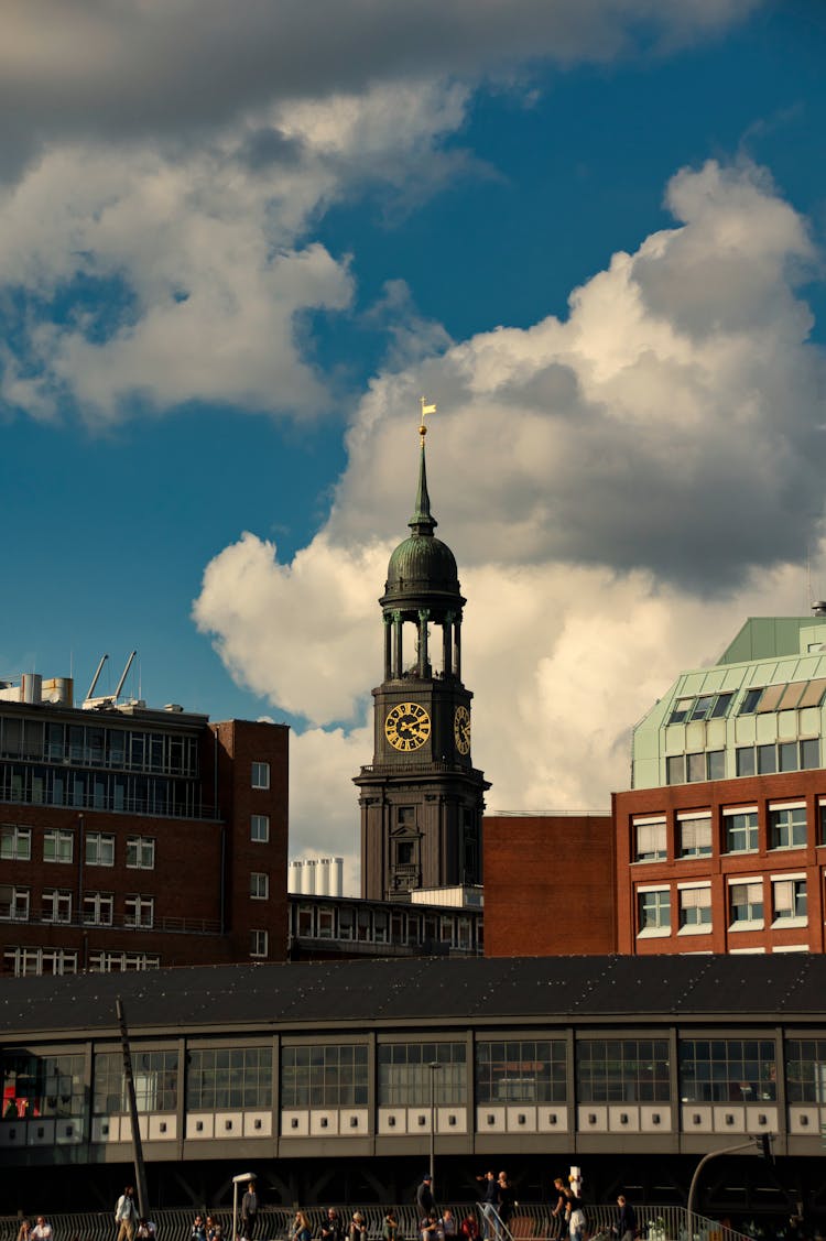 Clouds Over Tower In City