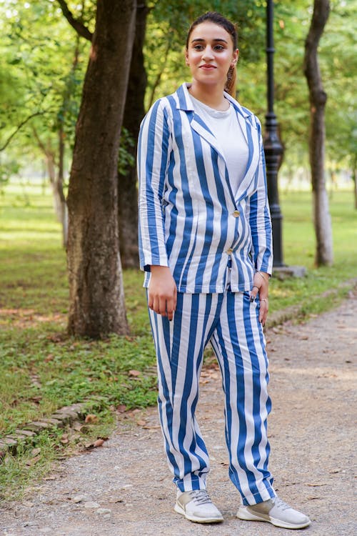 A Woman in Blue and White Striped Clothes