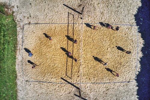 Free Bird's Eye View of People playing Volleyball on Sand  Stock Photo