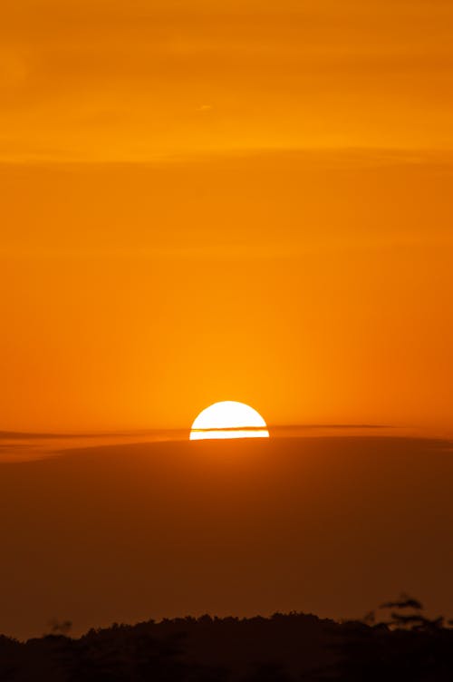Sun Setting over the Horizon