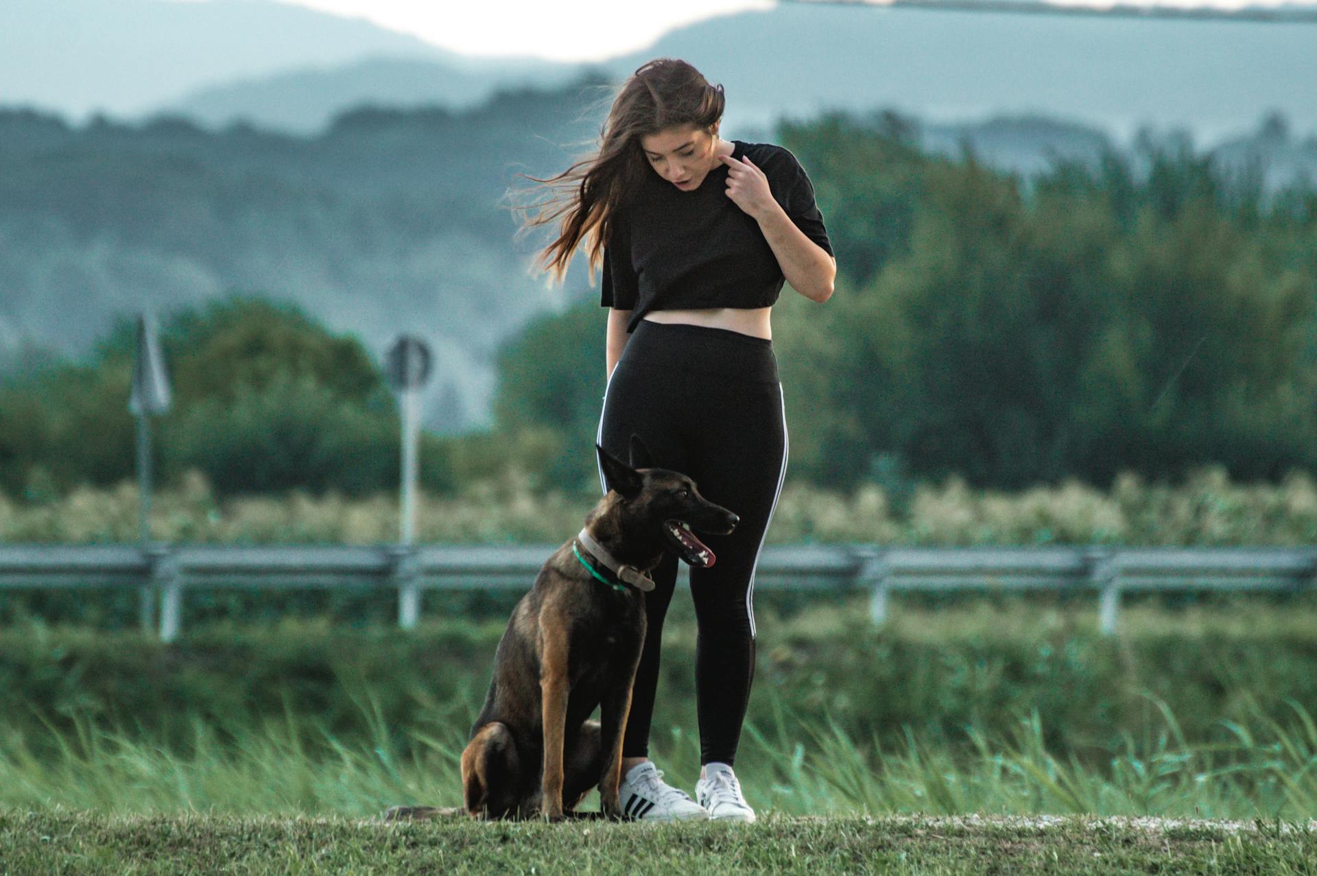 A Woman Looking at Her Pet Dog