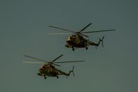 Helicopters Flying in the Sky