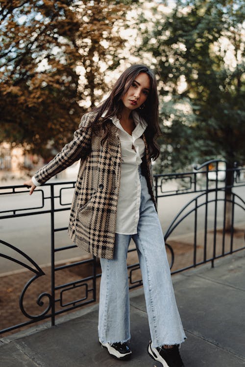 A Woman Wearing a Plaid Coat