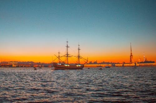 Ship Sailing on the Sea during Golden Hour 