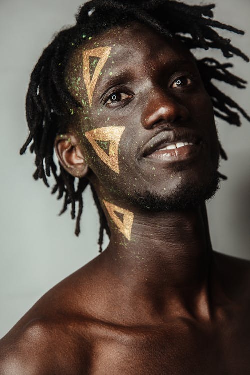 Portrait of Shirtless Man With Dreadlocks