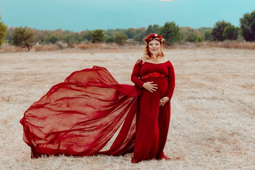 Pregnant Woman in Red Dress