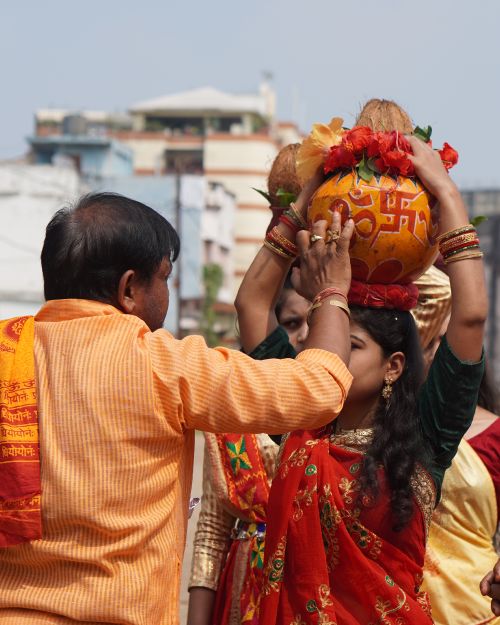 Free Festive Indian ceremony outdoors with people and cultural attire in vibrant colors. Stock Photo