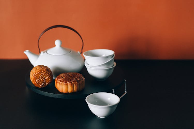 Stacked Teacups And Mooncakes