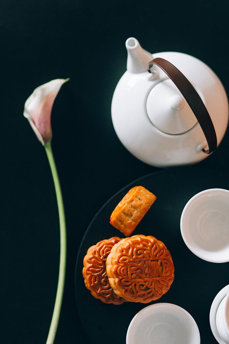 Stacked Mooncakes And Teacups