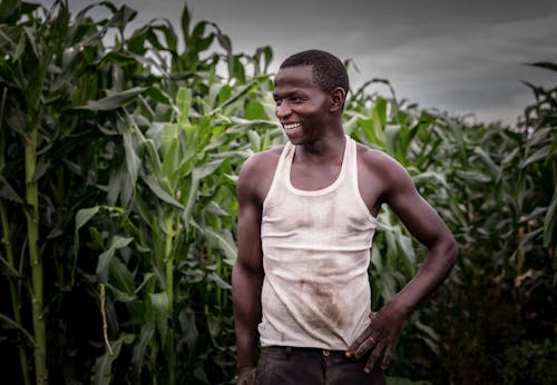 A Smiling Man on a Field