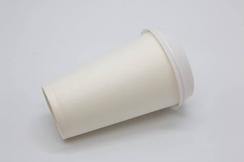 Free White Plastic Cup on White Table Stock Photo