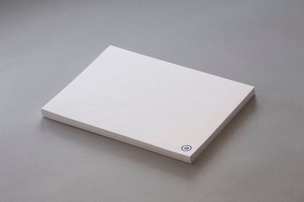 Stack of coated board sheets