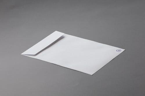 White Envelope on Gray Surface