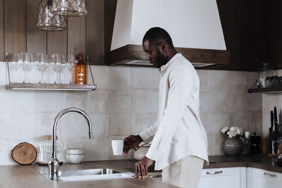 at the kitchen counter before breakfast evening routine weekday routine morning routine lifestyle photo 2