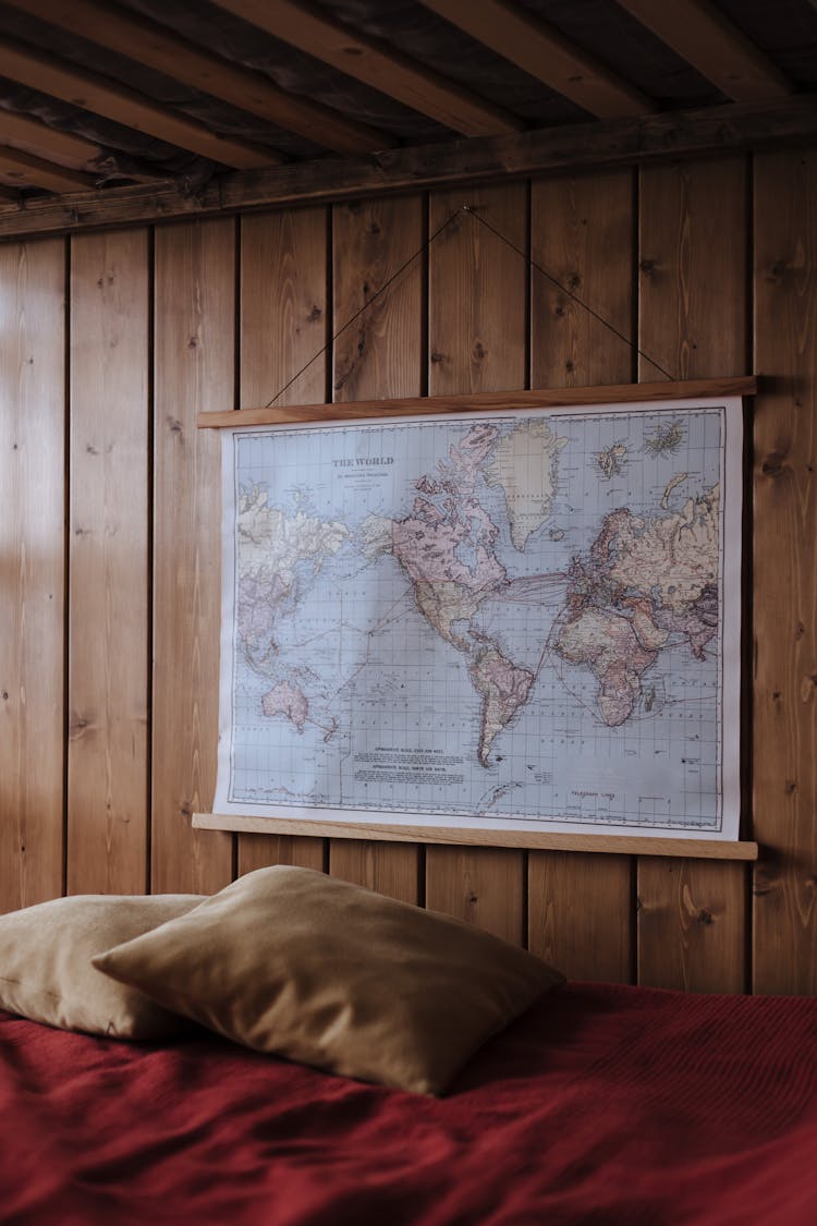 Map Hanging On Wooden Bedroom Wall