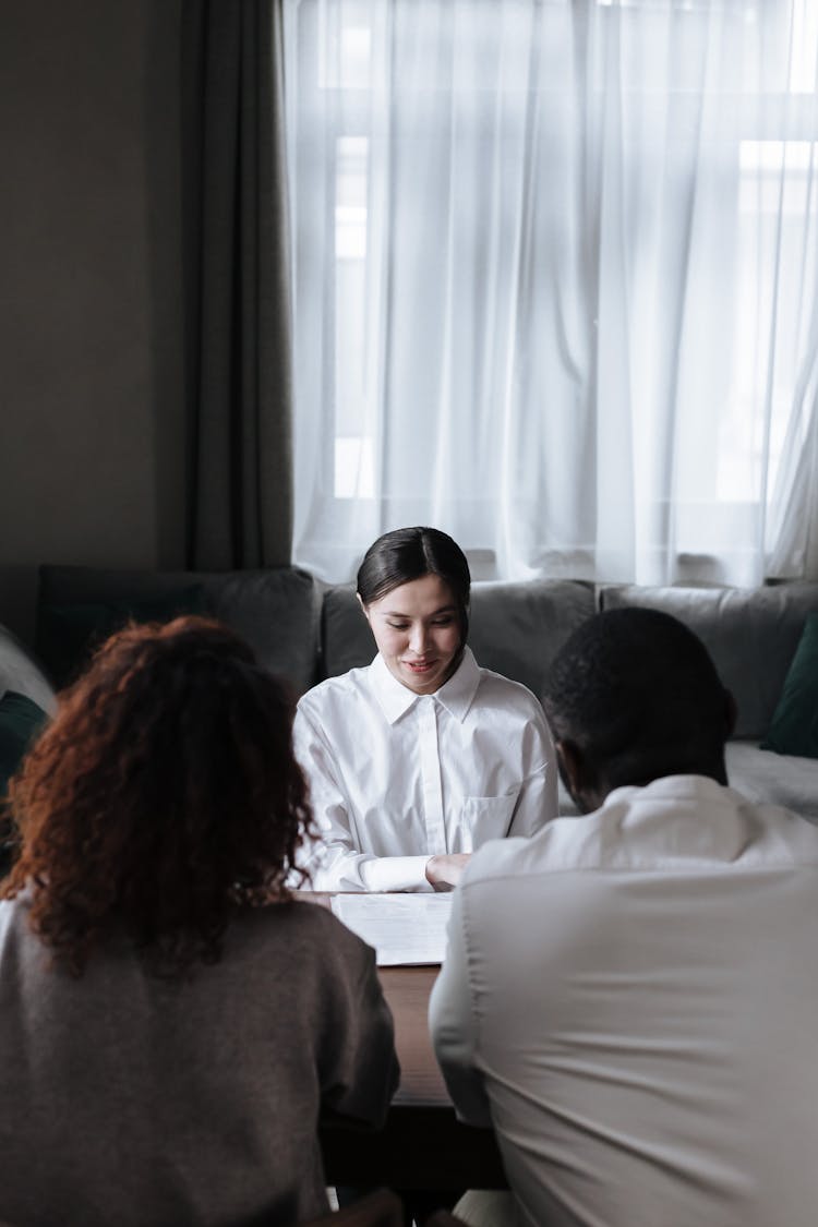 Social Worker Sitting Opposite Couple