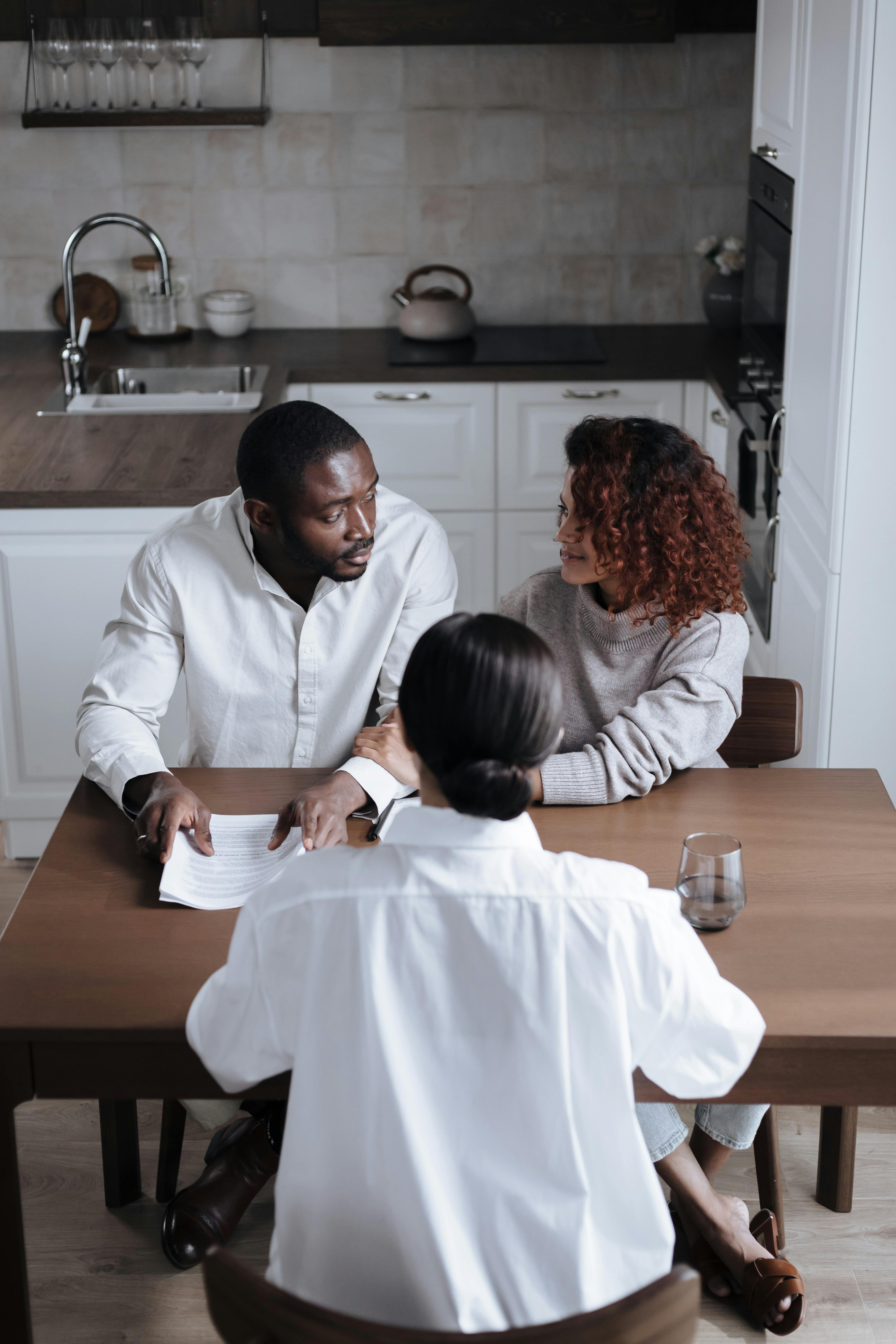 a people sitting at the table together