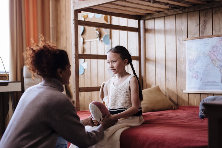 Mother And Daughter Talking 