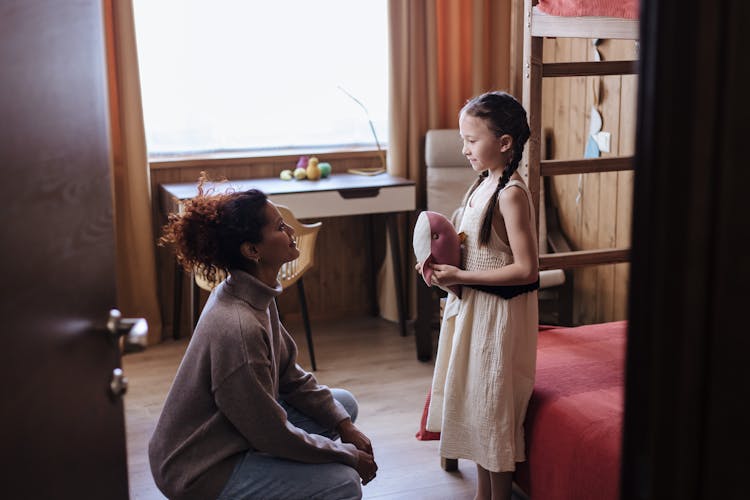 Mother And Daughter Talking 