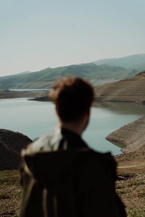 Free Backview of Man near Lake  Stock Photo