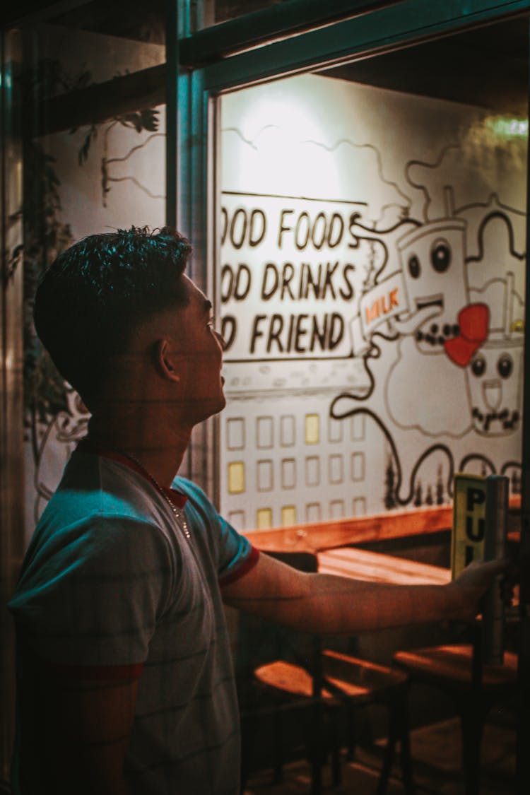 A Man Entering The Restaurant