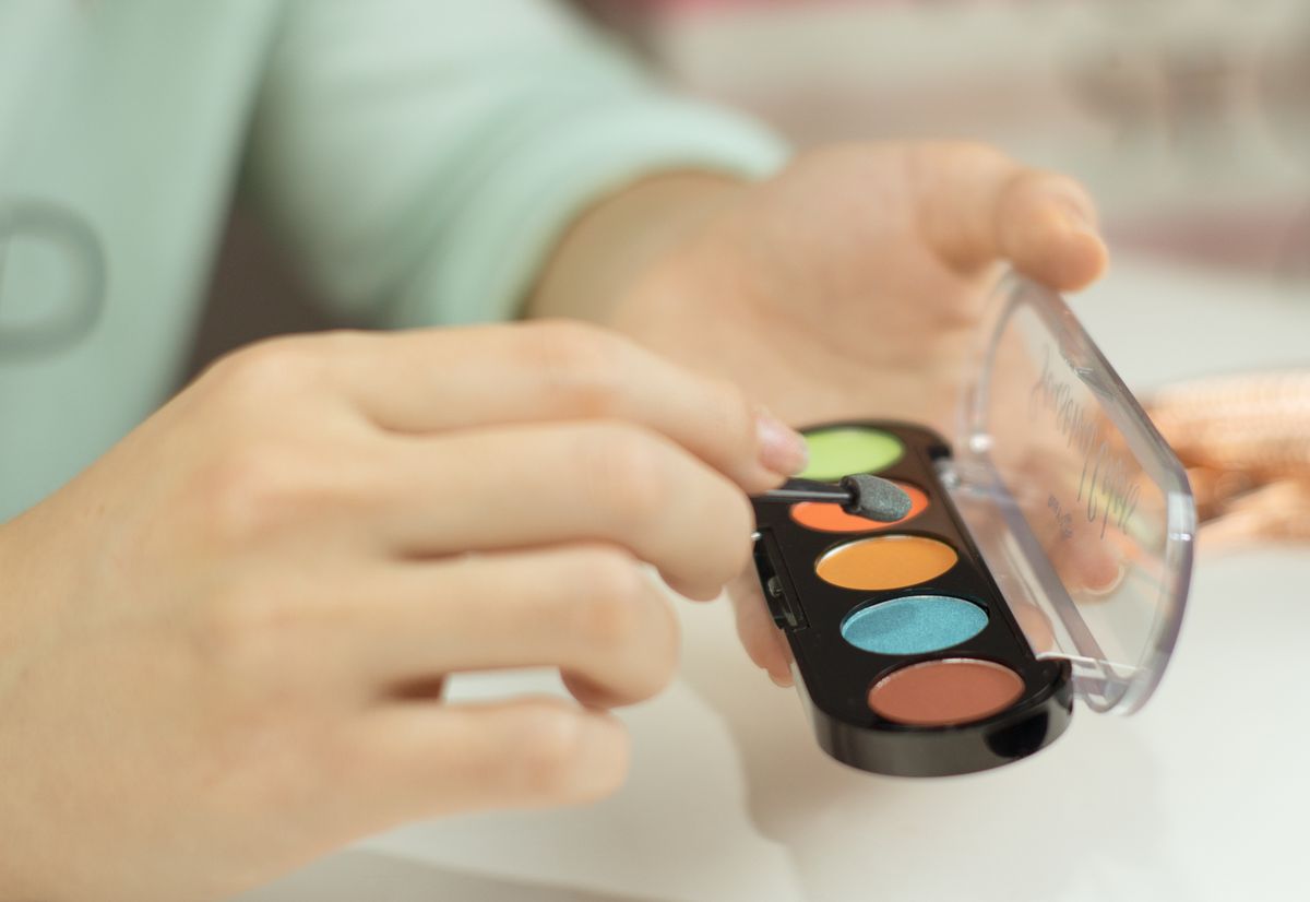 Close-up of eyeshadow being applied with a brush