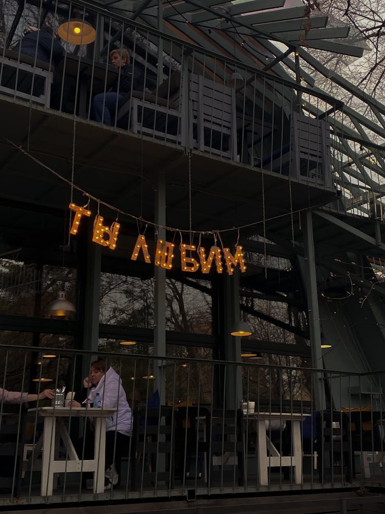 People Dining At The Balconies Of A Restaurant