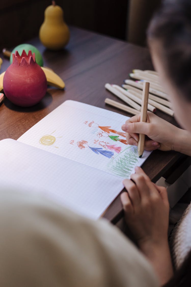 Child Making Family Drawing