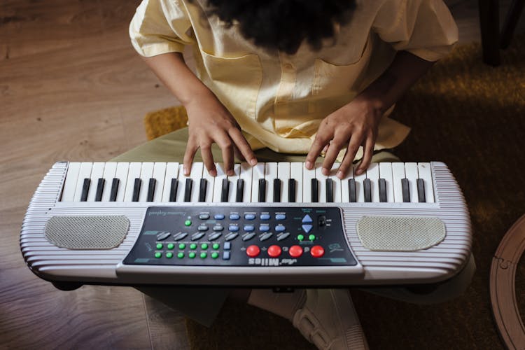 Boy Playing Synthesizer