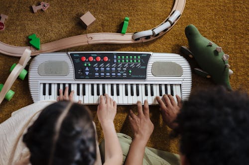 Children Playing Synthesizer Together