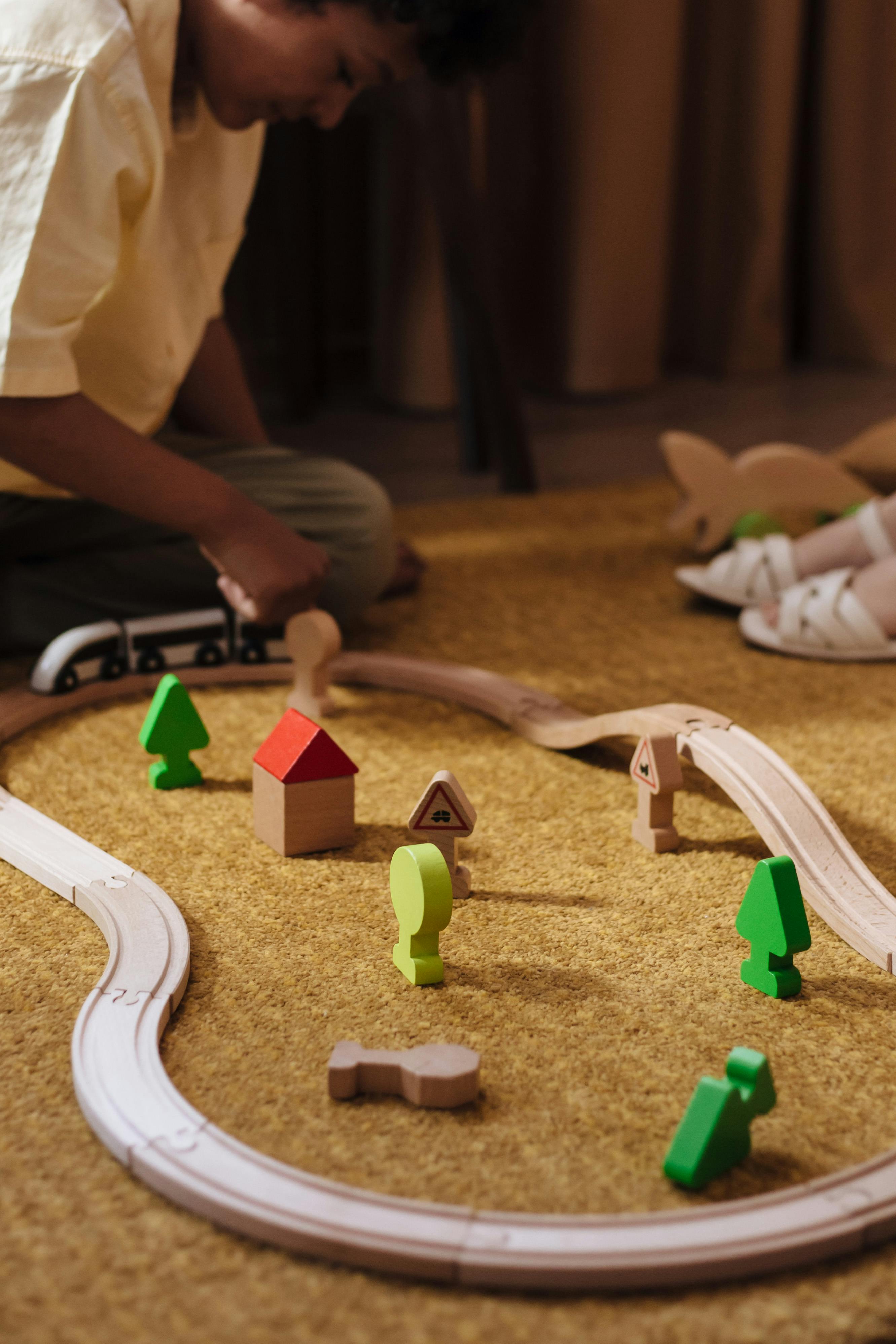 children playing with train toy