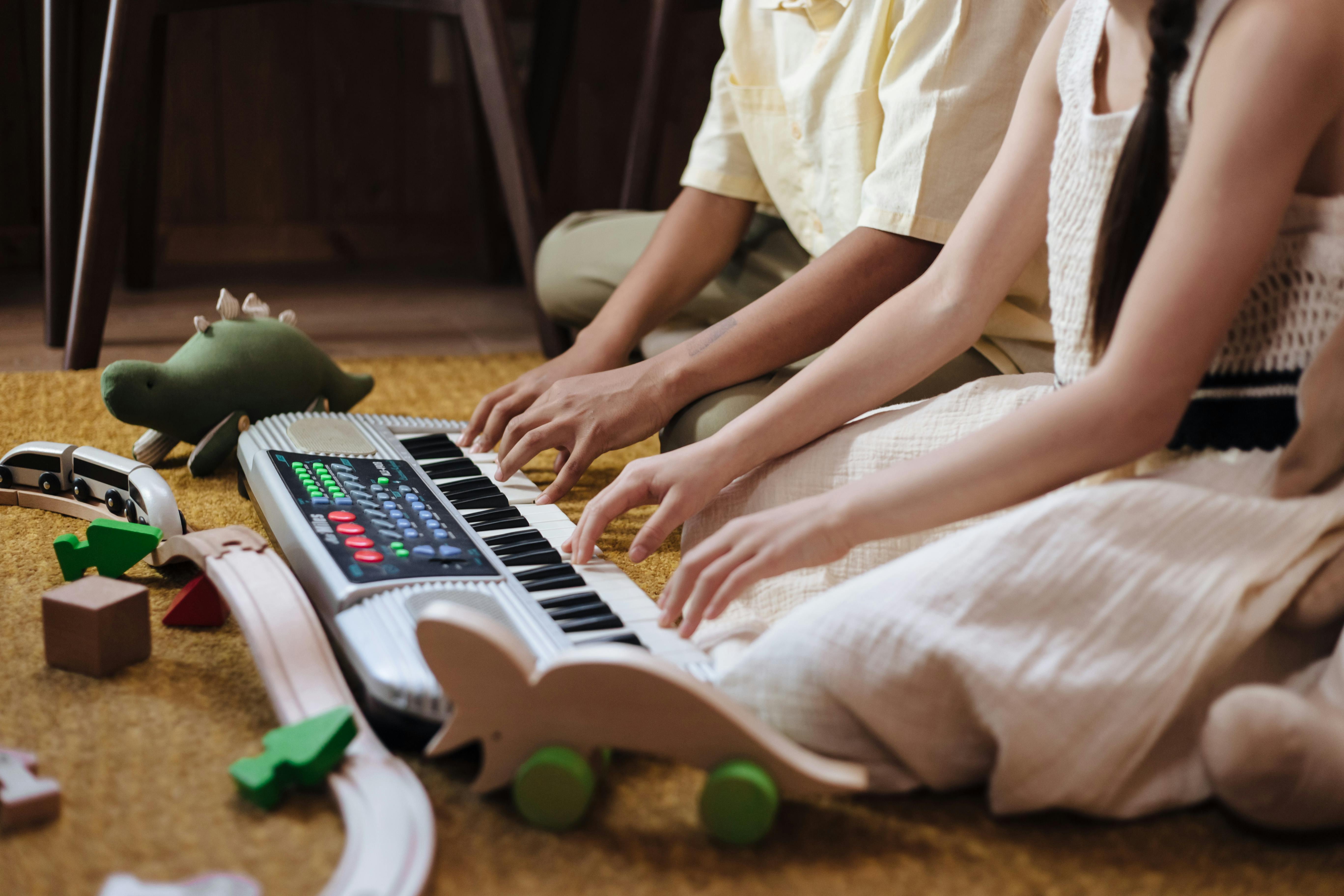 children playing synthesizer