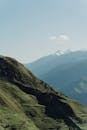 Free stock photo of blue sky, geological formations, green mountains