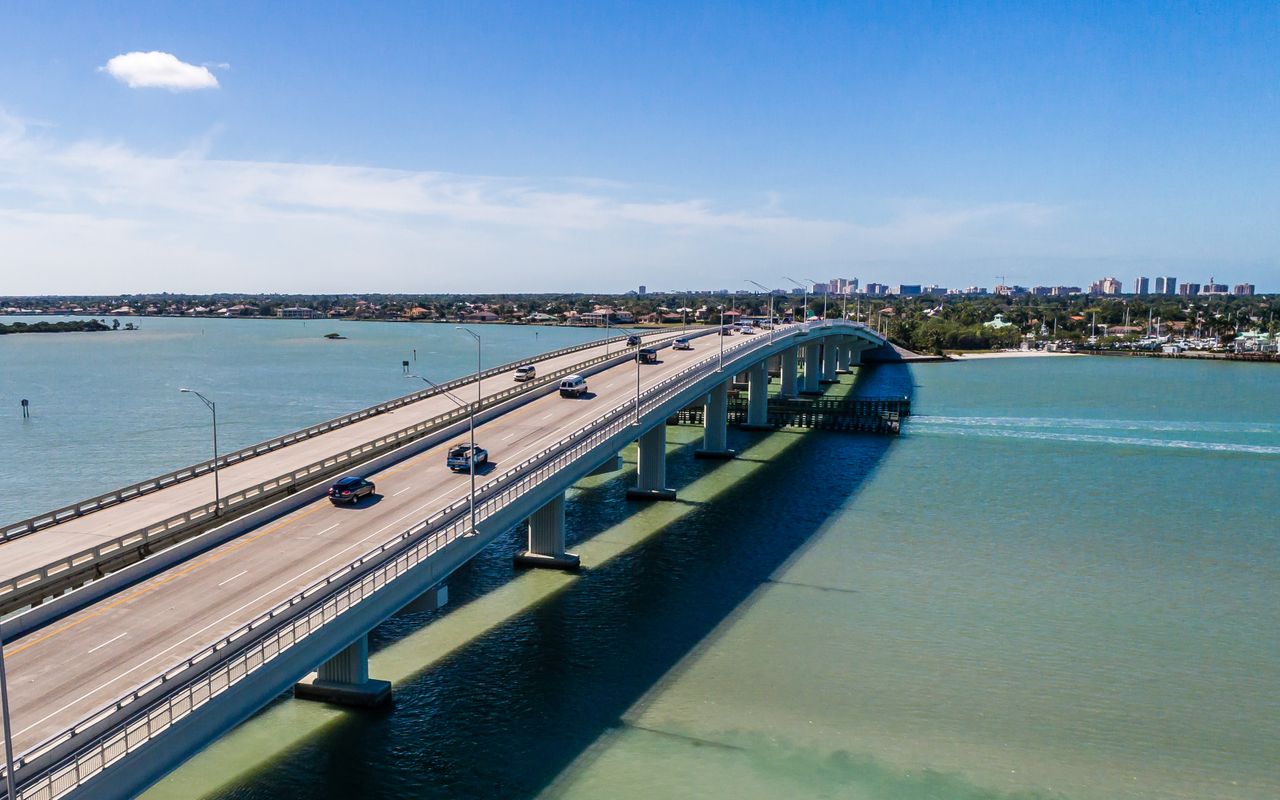 Aerial view of Jolley Bridge connecting Marco Island, Florida on a clear day.