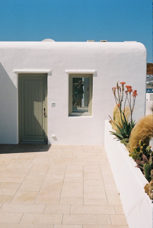 Door to House with White Wall