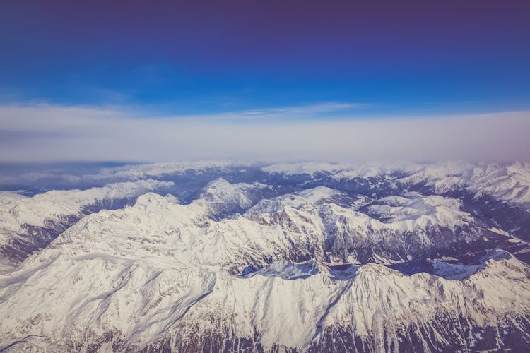 Snow Covered Mountain Under Blue Sky