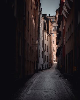 Discover the charm of a cobblestone alleyway in Södermalm, Stockholm, Sweden, perfect for city explorations.