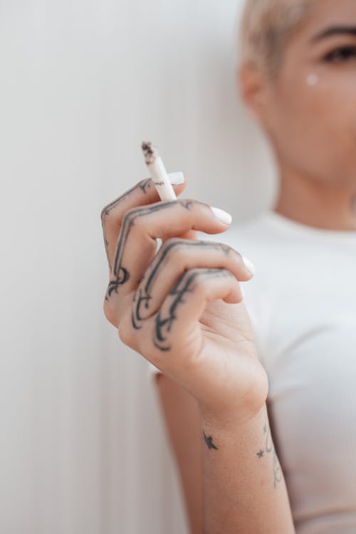 A Woman Holding a Cigarette
