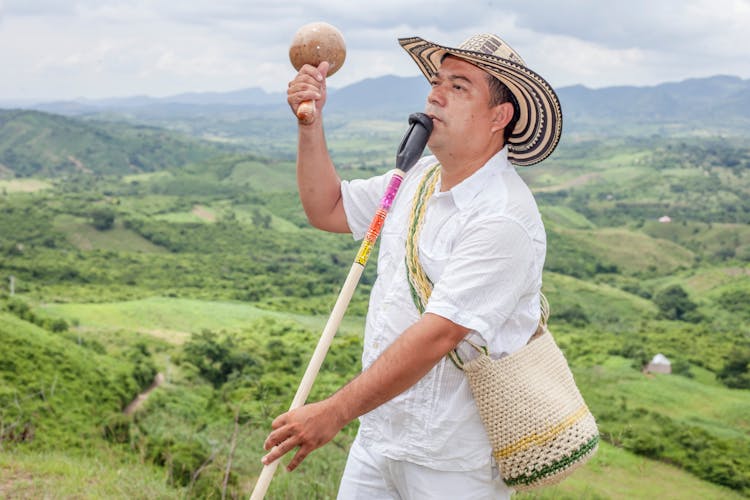 A Musician Playing Musical Instruments Simultaneously