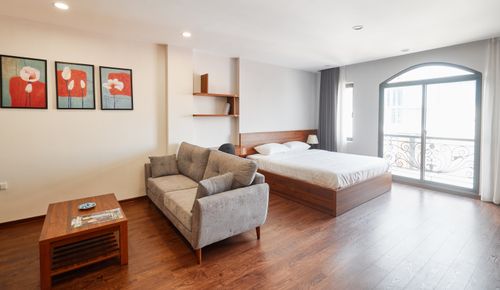 Free A bright and airy bedroom featuring elegant furniture and stylish decor with natural lighting. Stock Photo