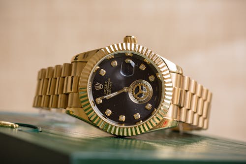 Free Close Up Shot of a Gold Rolex Stock Photo