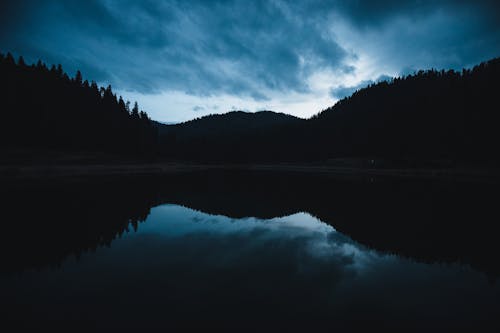 Kostnadsfri bild av bakgrundsbelyst, berg, clouds