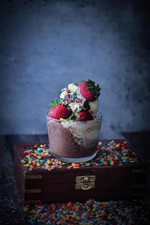 Ice Cream with Strawberries and Sprinkles on the Top 